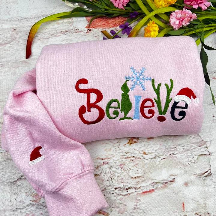 believe Glitch embroidered Christmas hoodie