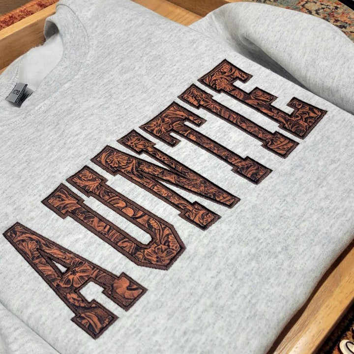 Embossed Faux Leather Applique Sweatshirt