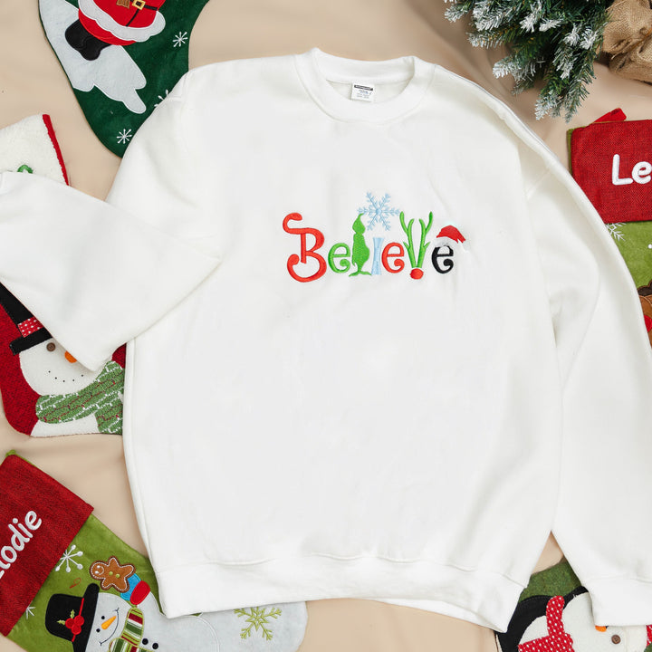 believe Glitch embroidered Christmas hoodie