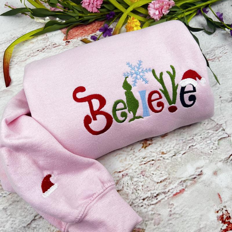 believe Glitch embroidered Christmas hoodie