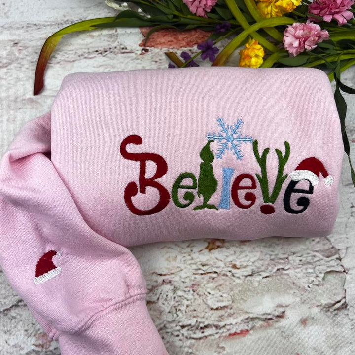 believe Glitch embroidered Christmas hoodie